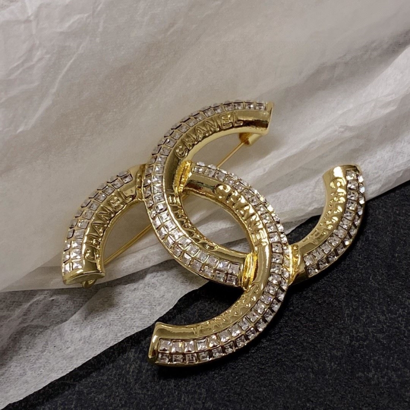 Ch**el brooches